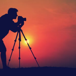 Man Photographer Taking Pictures Silhouette Concept; Shutterstock ID 331505345